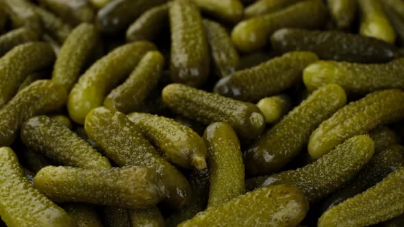 Pickled gherkins cucumbers close up rotation