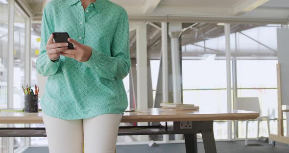 Young woman working in a creative office