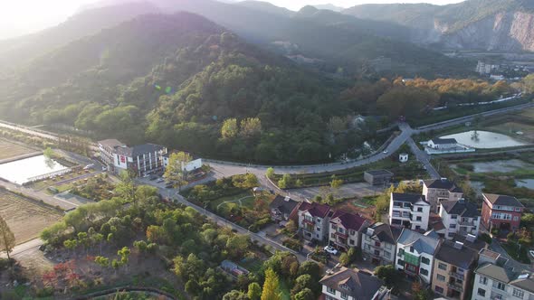 Mountain village and farmland in the sunset