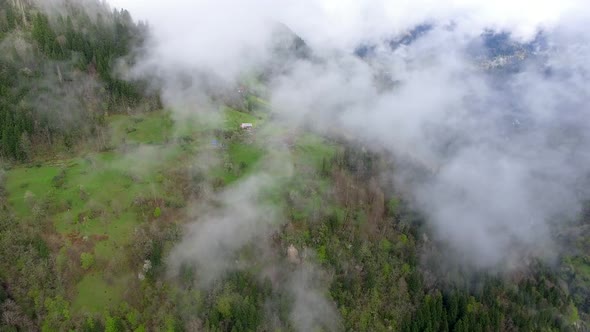 Mountain Village House Among the Clouds