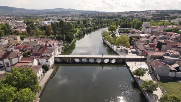 Aerial view over Tamega River and Roman bridge Landscape, Chaves Downtown - Portugal