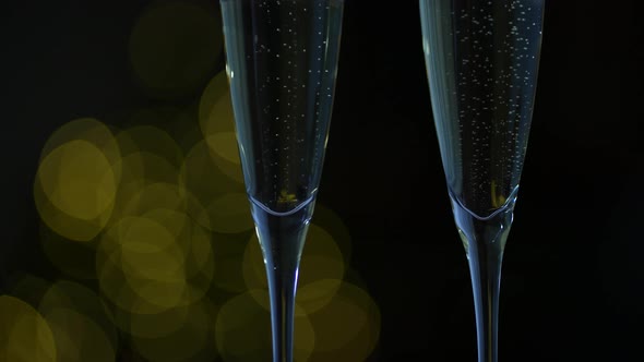 A Glass of Champagne on a Black Background