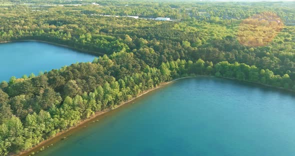 Landscape Panorama Blue Water in a Forest Lake with Trees