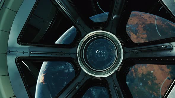 A View of the Earth Through the Big Quadrangle Porthole of a Space Station alt