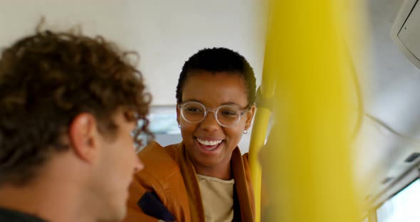 Couple interacting with each other while travelling in bus 4k