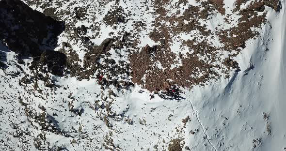 Top View of a Group of Tourists on a Peak