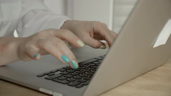 Female Hands of Business Woman Professional User Worker Using Typing on Laptop Notebook Keyboard Sit