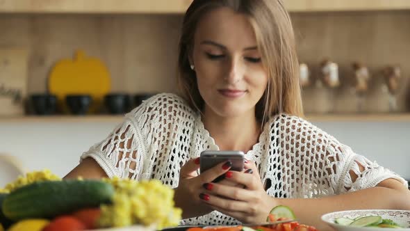 Woman Uses Smartphone