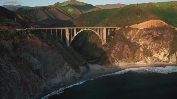 Sunset Outdoor. Drone If Flying Towards the Scenic Arch Bridge at Big Sur Park