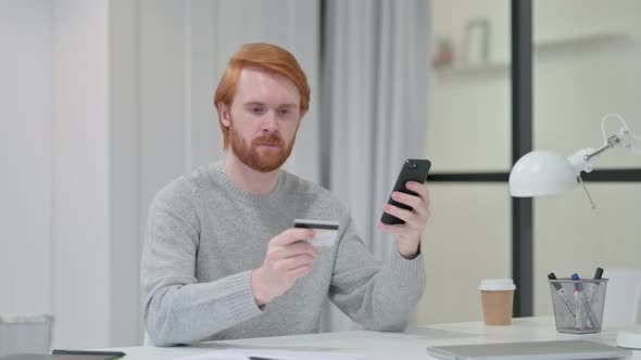 Successful Online Payment on Smartphone By Redhead Man 