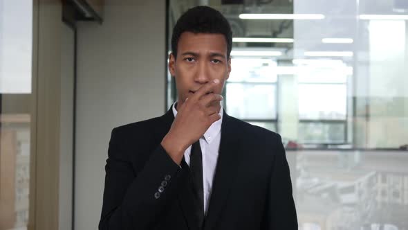 Amazed Black Businessman in Suit, Surprised Gesture