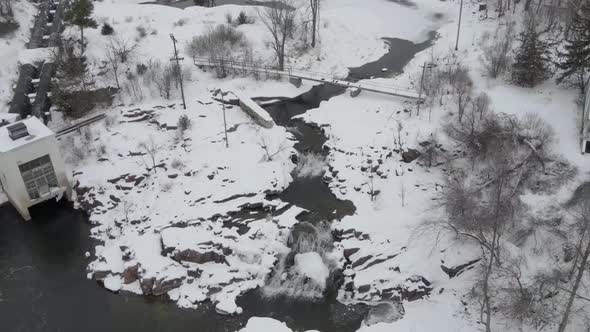 Ariel small frozen waterfall during winter