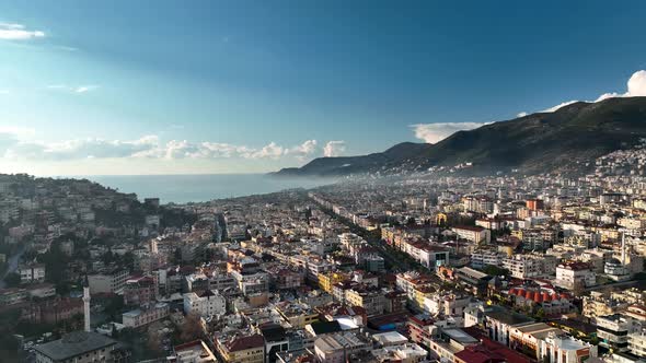 Colorful Panorama sunset over the city Aerial View 4 K Alanya Turkey