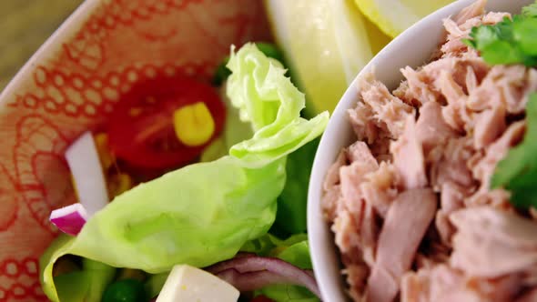 Raw meat and vegetables in bowl