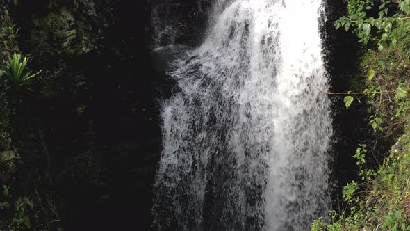 White water flowing over falls, Natural Bridge Waterfall Springbrook, Queensland