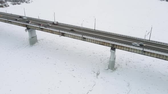 A Stream of Cars Moves Through the Tomsk Road Bridge