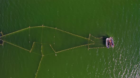 Aerial View to the Baltic Sea with the Fish Traps and Fishers