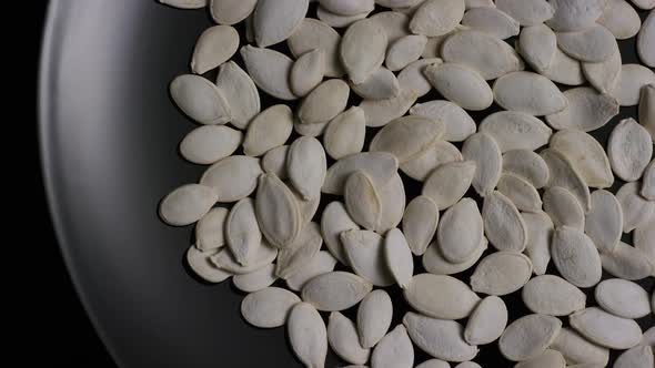 Cinematic, rotating shot of pumpking seeds - PUMPKIN SEEDS 002