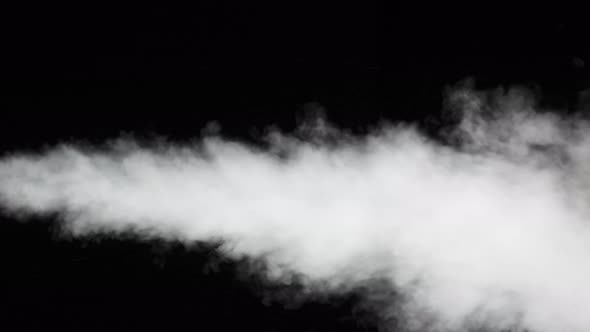 Water Vapor. White Jet of Vapour Steam Under Pressure on Black Background