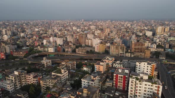 Panning wide aerial shot of Dhaka huge developed urban scenery, Bangladesh