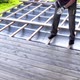 Fixing a wooden terrace board 4K - VideoHive Item for Sale