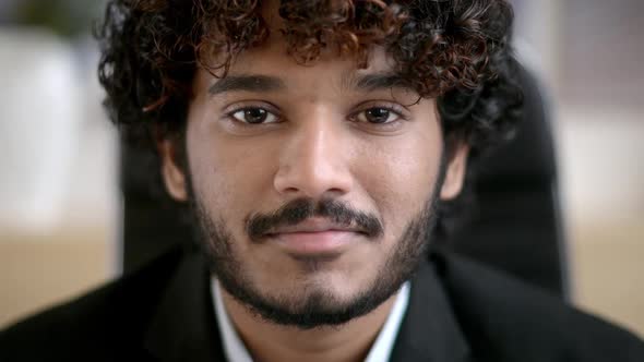 Confident Smiling Curlyhaired Indian Business Man Small Business Owner Company Leader or Sales