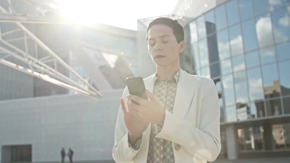 Businesswoman Using Mobile Internet