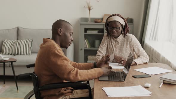 African-American Couple Shopping Online