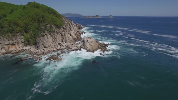View From a Droneon a Stone Cape Washed By Strong Waves