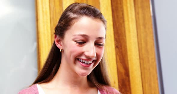 Portrait of smiling schoolgirl