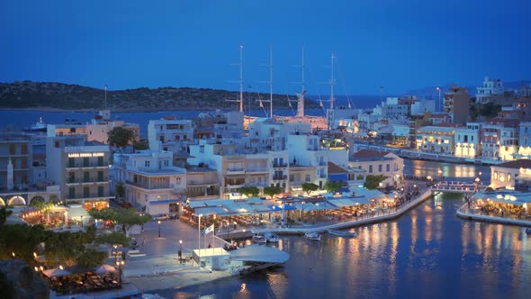 Beautiful Agios Nikolaos Town on Lake Voulismeni at Night. Island Crete, Greece