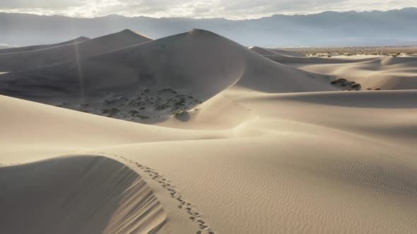 Scenic Nature Aerial Sunset Light on White Sand Dunes Sun Ray Desert Landscape