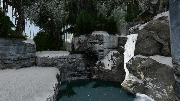 Waterfall in the middle of the forest when it's snowing