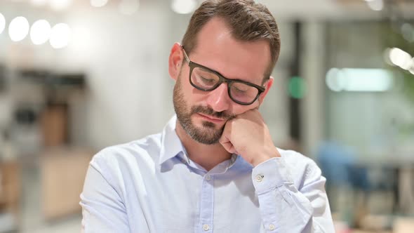 Portrait of Sleepy Businessman Taking Nap