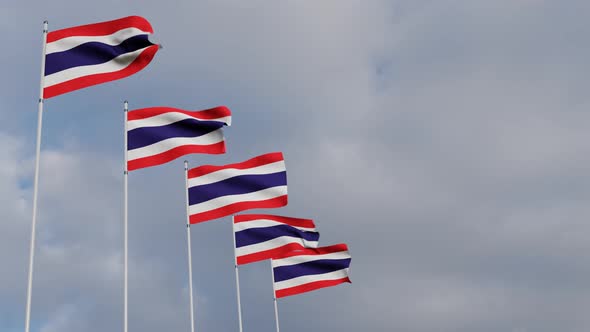 Waving Flags Of The Thailand blue sky