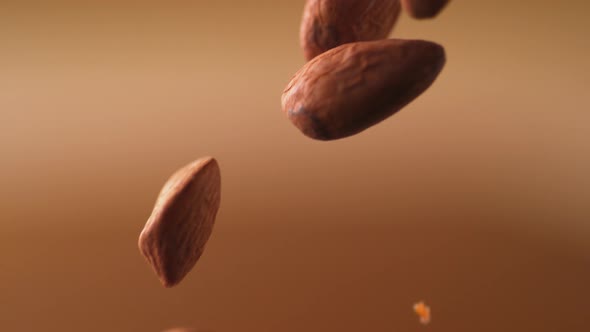 Almonds falling. Slow Motion.