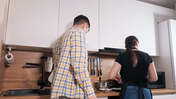 Man Tried an Unsuccessfully Prepared Pancake Made a Grimace and Spat Out