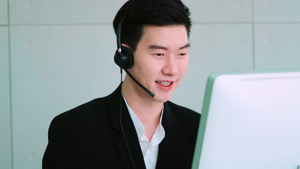 Business People Wearing Headset Working in Office