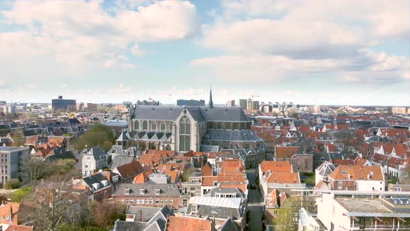 Aerial shot flying high over the historical city centre of Leiden, the Netherlands, with the Pieters