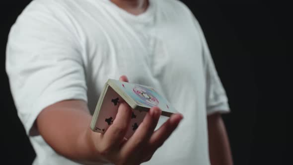 Man Showing His Trick With Usual Cards, One Handed Cut