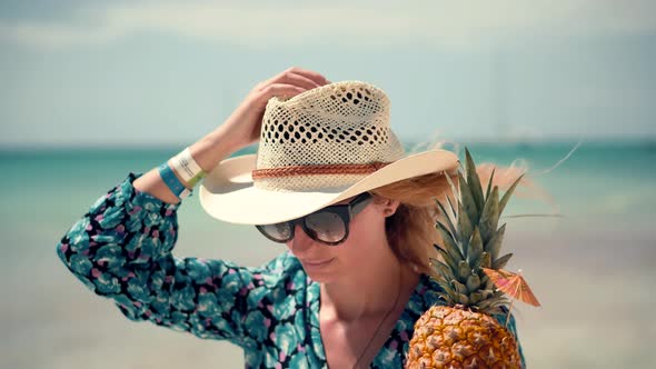 Travel Girl Relaxing On Caribbean Beach Saona Island. Girl Drinking  Pina Colada On Tropical Beach.