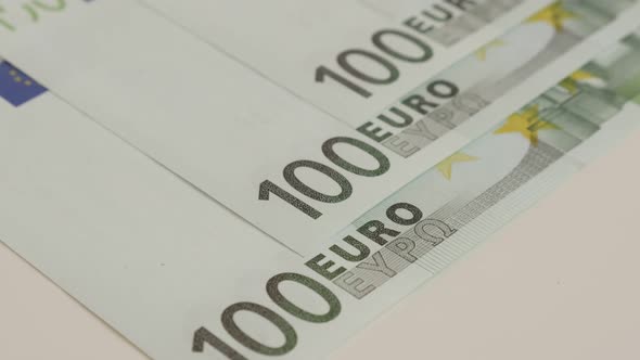 Rows of EU banknotes  money background  slow tilt 4K 2160p 30fps UltraHD  footage - Lot of 100 paper