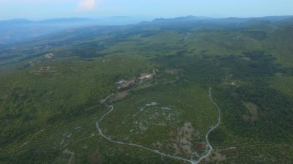 Aerial view of remote village in green peaceful valley