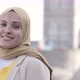 Smiling woman wearing hijab in the city, London, England - VideoHive Item for Sale