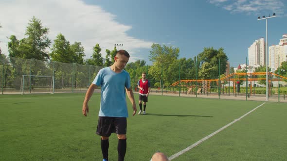 Conflict Between Two Diverse Soccer Players on Football Pitch