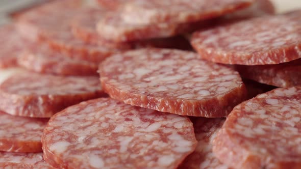 Tasty cured sausage of air-dried meat cuts slow pan 4K 2160p 30fps UltraHD footage - Dry  salami  sm