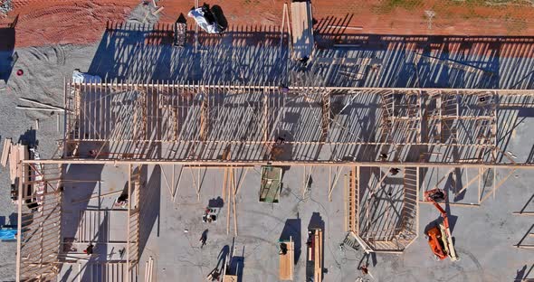 Framing of Under Construction Wooden House Building Frame Structure on New Development