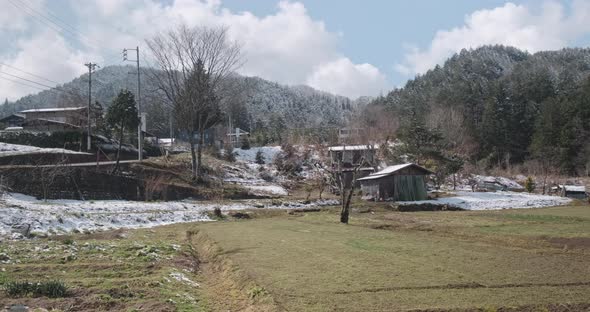 Walking Along Japanese Rural Landscape with Traditional Houses at Spring. Beautiful Landscape with