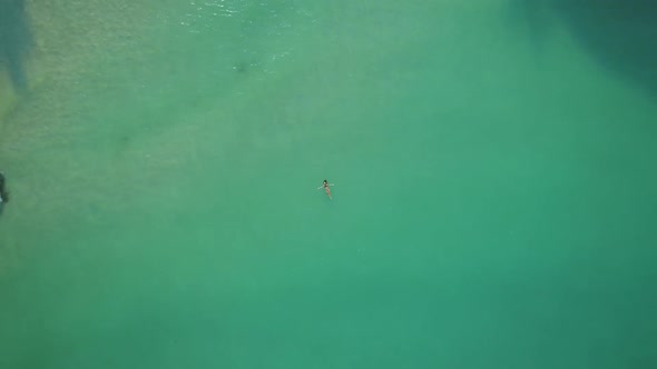 Exotic Lagoon Water Surface Girl Swim Top View