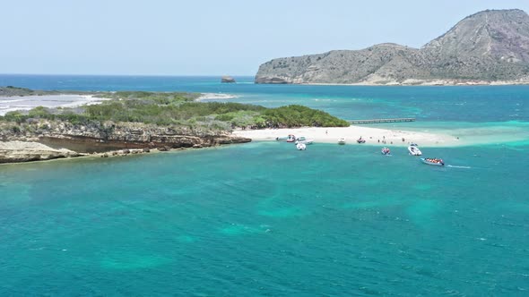 Tourist Boats Docked At Isla Cabra At Montecristi Bay In Dominican Republic. - aerial